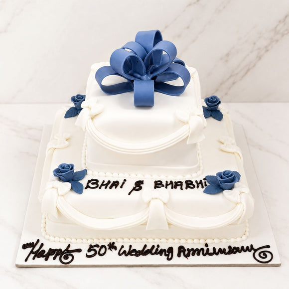 Golden Anniversary Elegance Bow Cake
