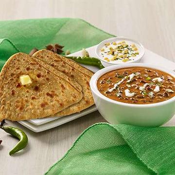 Tawa Parantha 2pcs with Dal And Raita